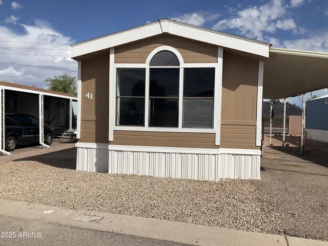 a view of a house with a porch