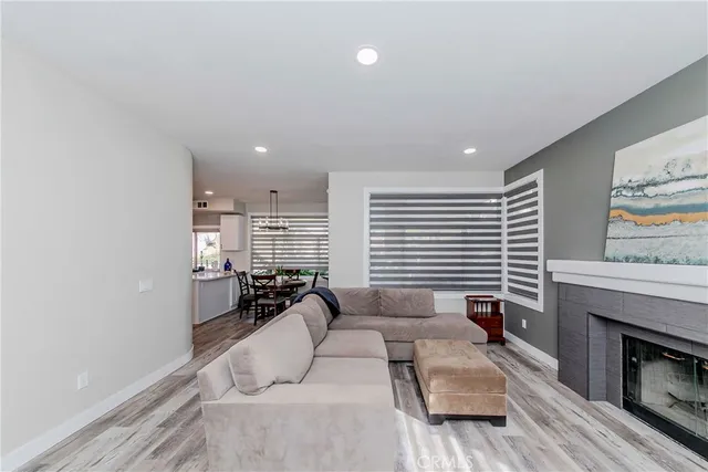 a view of a livingroom with furniture and a window