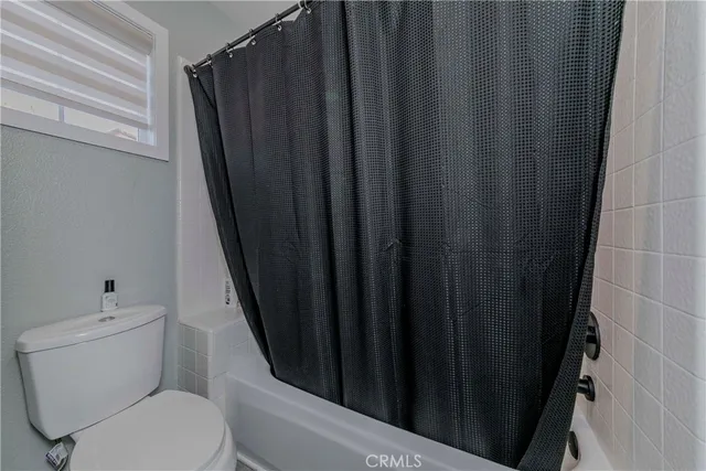 a view of balcony with wooden floor