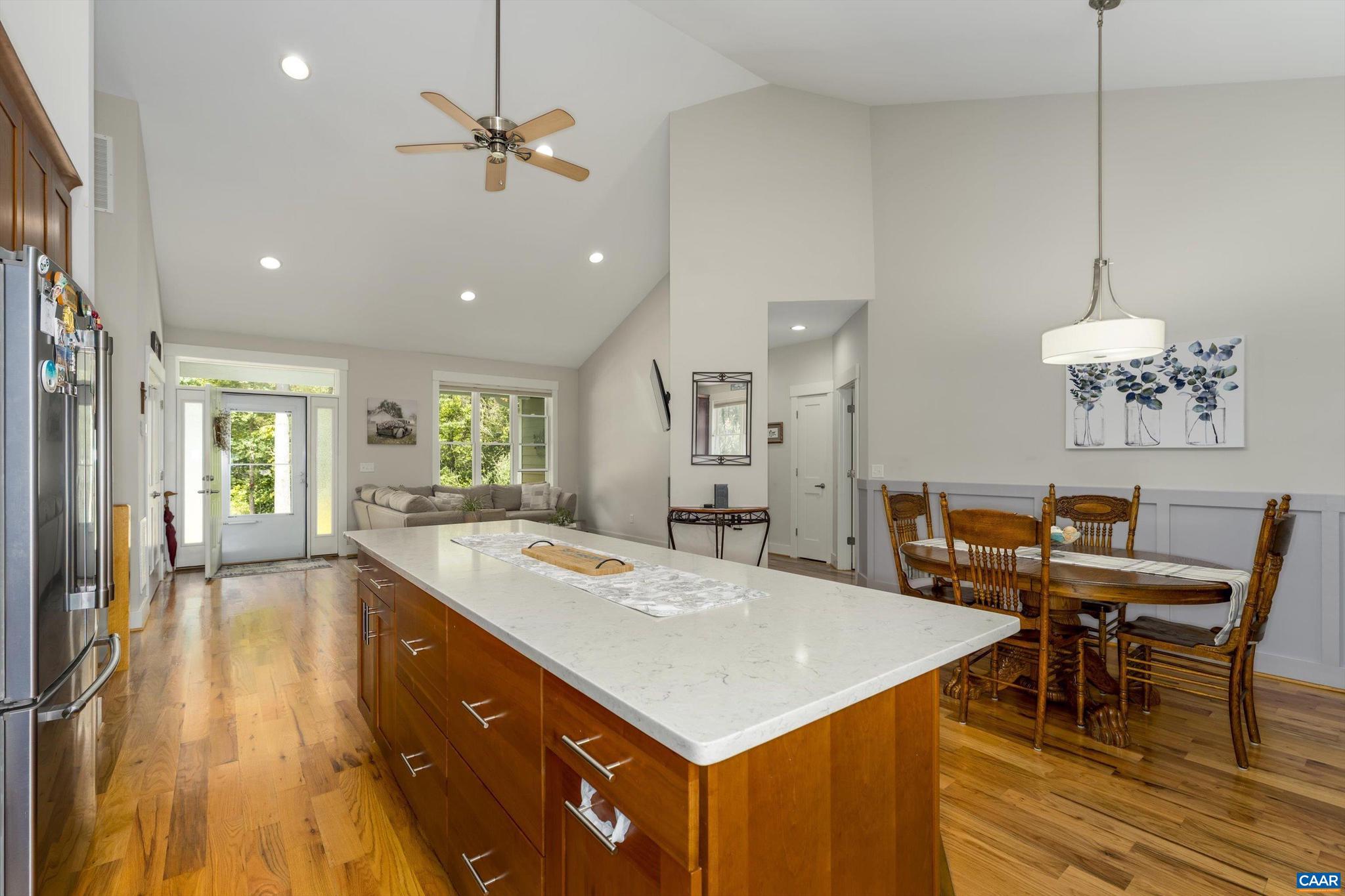 336 Bear Run Road Stanardsville, VA 22973 - Photo 17 of 67 a view of a dining room with furniture and a chandelier