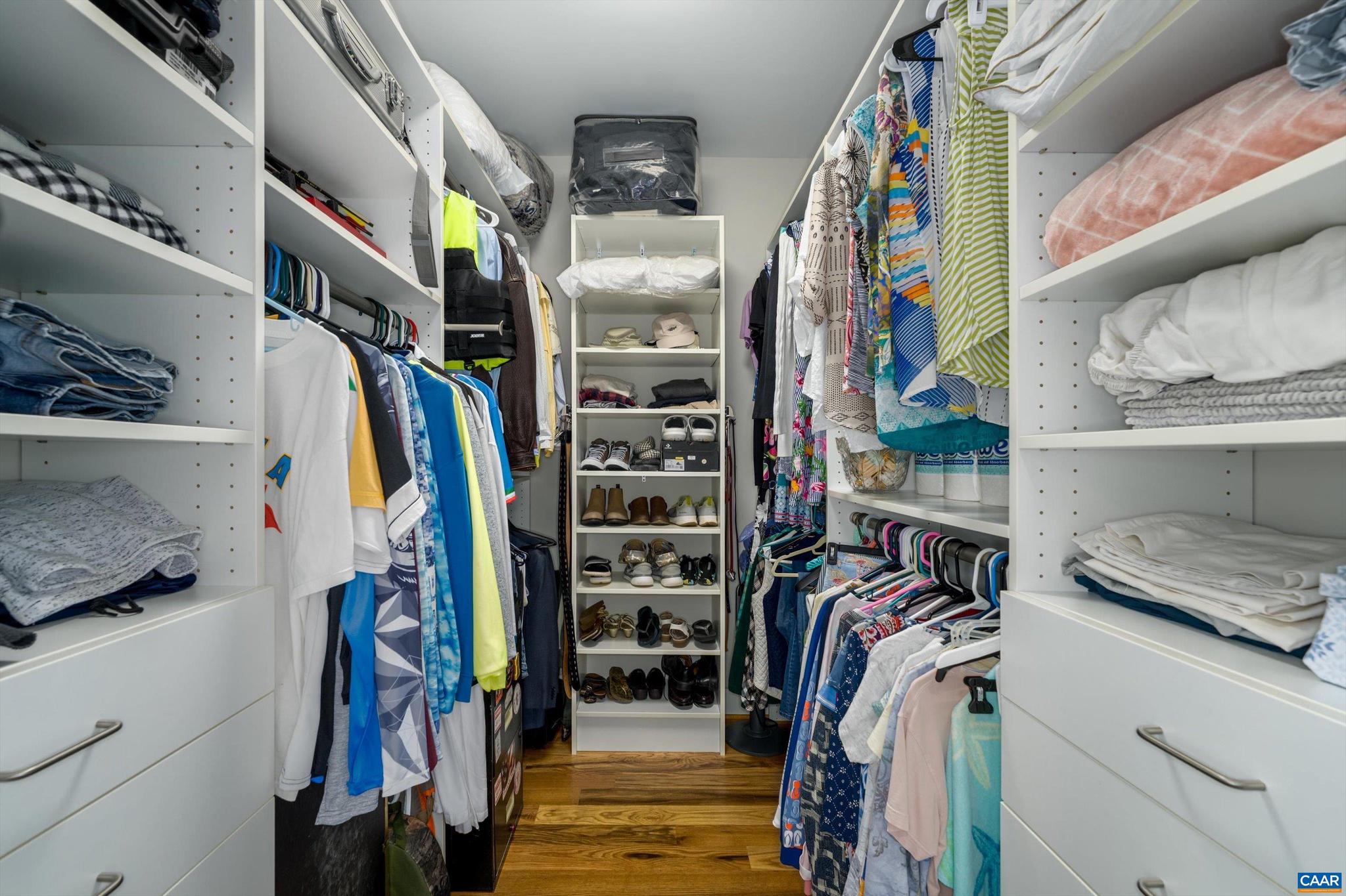 336 Bear Run Road Stanardsville, VA 22973 - Photo 36 of 67 a view of walk in closet with clothes and shoes