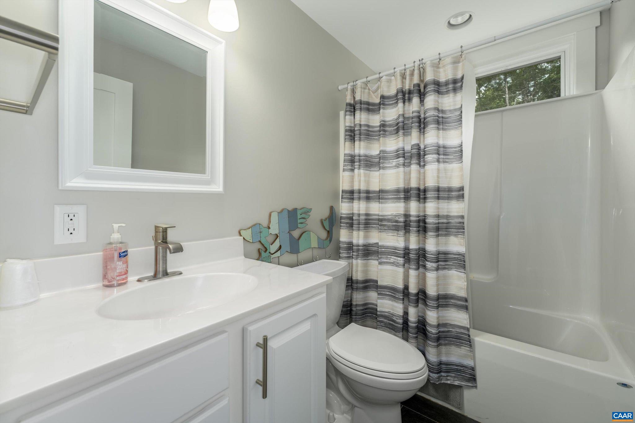 336 Bear Run Road Stanardsville, VA 22973 - Photo 52 of 67 a bathroom with a sink toilet and shower
