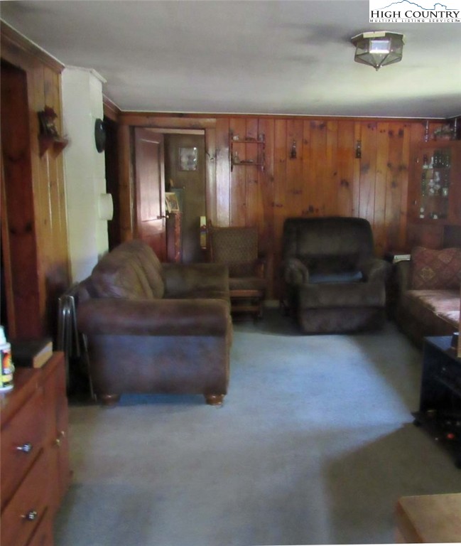 458 Paul Goodman Road Fleetwood, NC 28626 - Photo 13 of 22 a living room with furniture and a fireplace