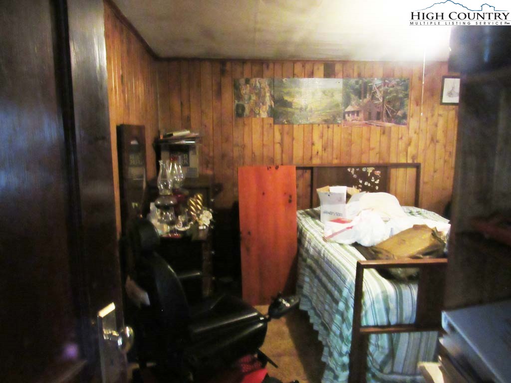 458 Paul Goodman Road Fleetwood, NC 28626 - Photo 16 of 22 a bathroom with a sink and mirror