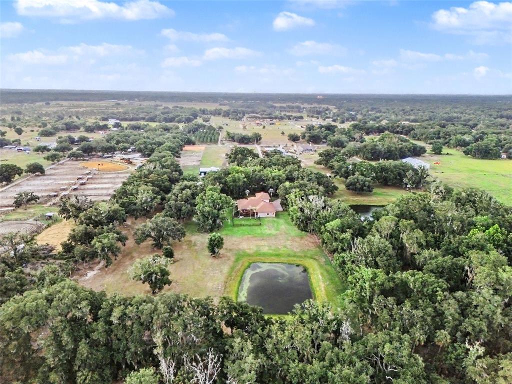 339 Corbett Road Lithia, FL 33547 - Photo 37 of 38 an aerial view of residential building and trees around