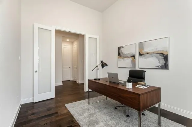 a view of workspace with wooden floor
