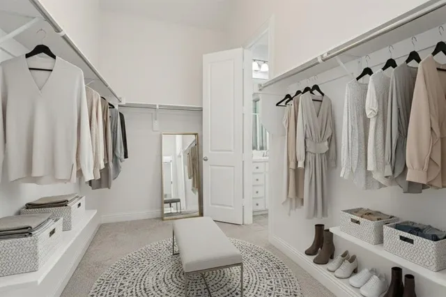 a bathroom with a tub sink and a shower
