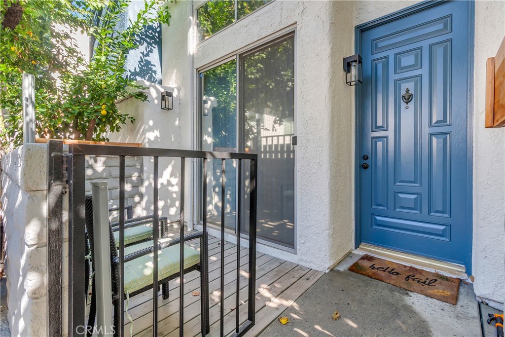 12334 Chandler Boulevard, Unit C Valley Village, CA 91607 - Photo 2 of 30 a view of a balcony with wooden floor