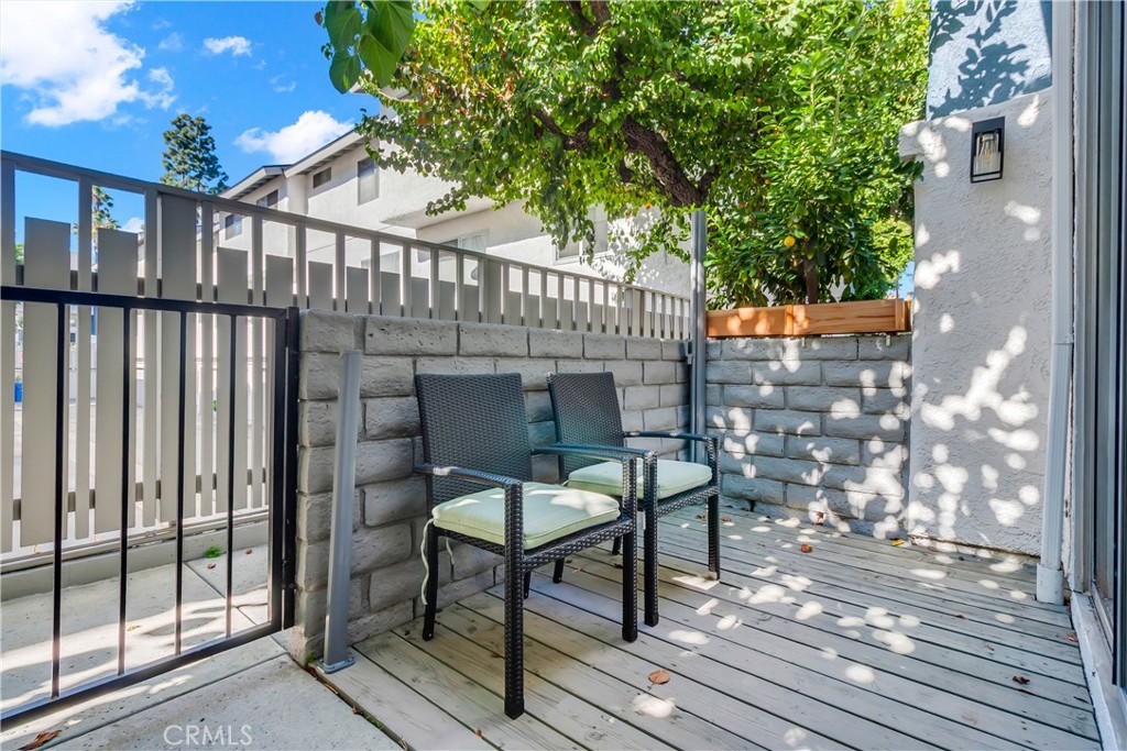 12334 Chandler Boulevard, Unit C Valley Village, CA 91607 - Photo 24 of 30 a view of a chairs setting on the roof deck