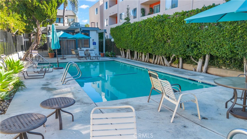 12334 Chandler Boulevard, Unit C Valley Village, CA 91607 - Photo 29 of 30 a view of a chairs and table in patio