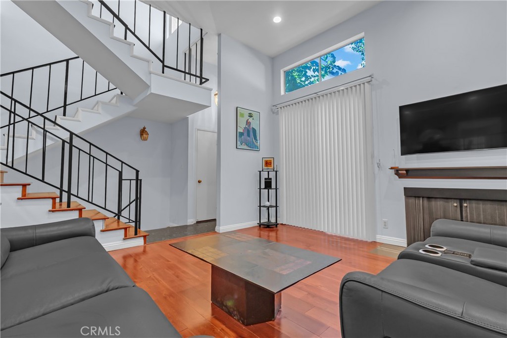 12334 Chandler Boulevard, Unit C Valley Village, CA 91607 - Photo 4 of 30 a view of a livingroom with furniture and a flat screen tv