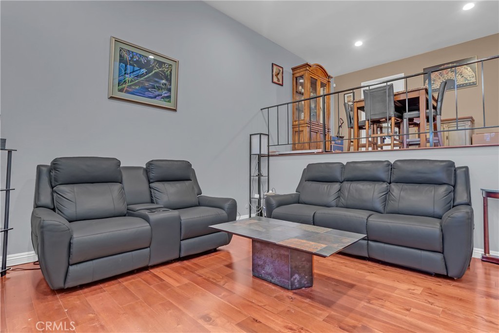 12334 Chandler Boulevard, Unit C Valley Village, CA 91607 - Photo 5 of 30 a living room with furniture and kitchen view