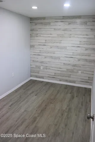 a view of a small space built with hardwood