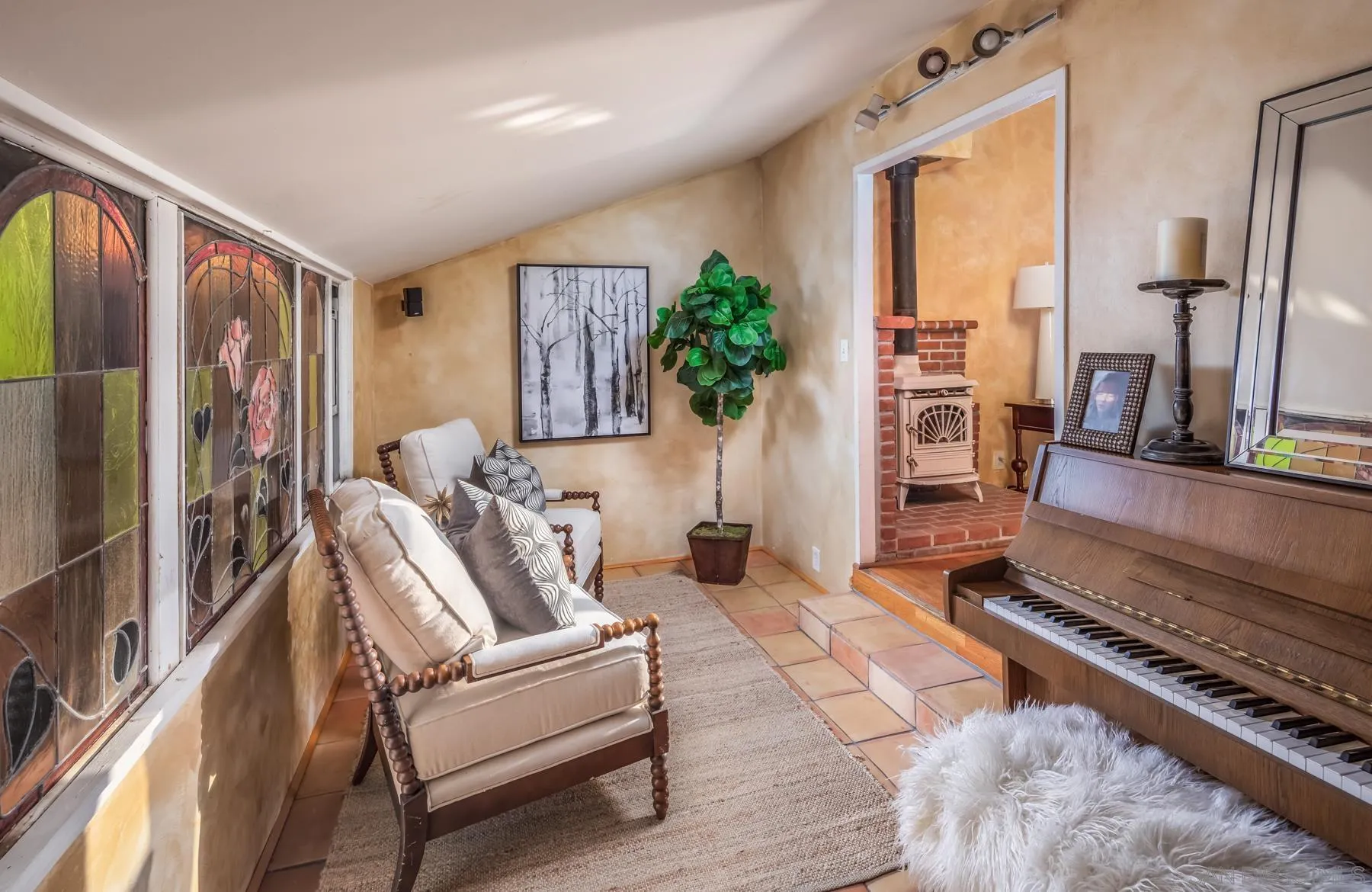 110 8th Street Del Mar, CA 92014 - Photo 12 of 24 a living room with furniture rug and a table