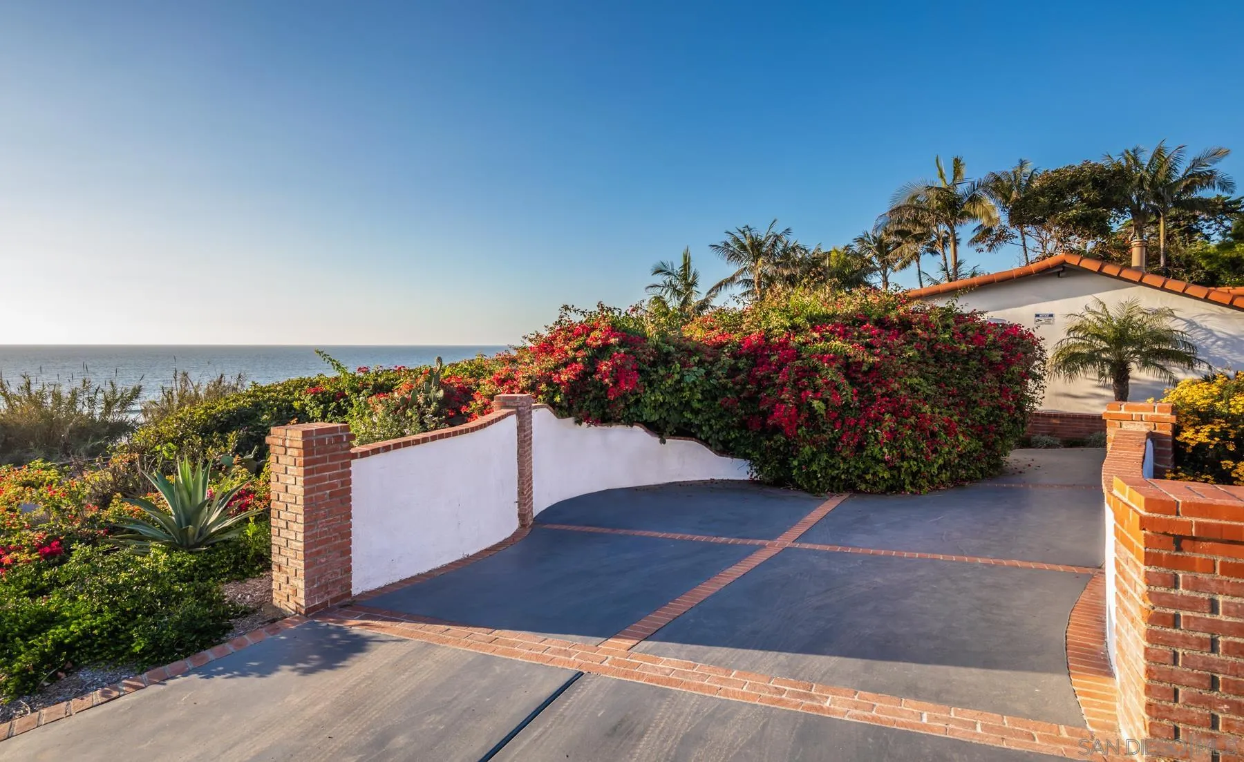 110 8th Street Del Mar, CA 92014 - Photo 4 of 24 a view of a terrace with a garden