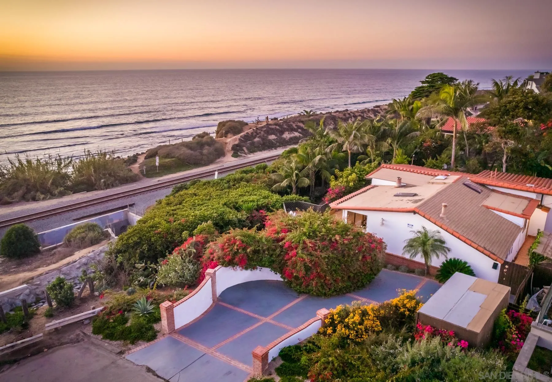 110 8th Street Del Mar, CA 92014 - Photo 5 of 24 an aerial view of residential houses with outdoor space