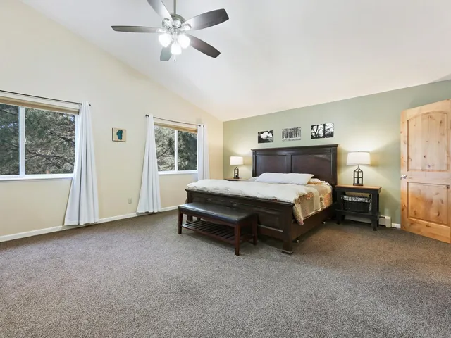a view of a mirror and cabinets