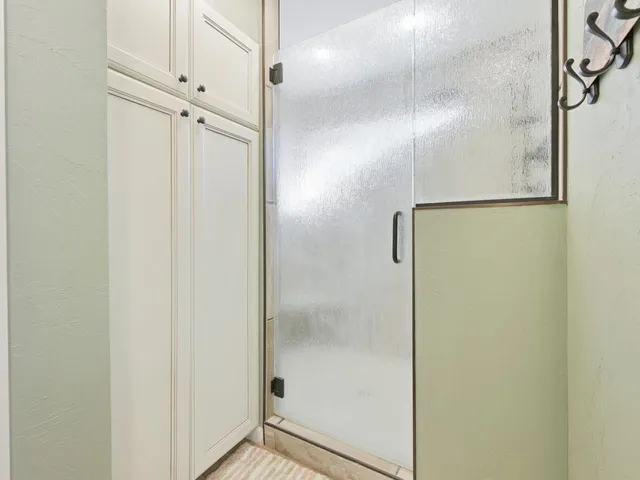 a living room with furniture and windows