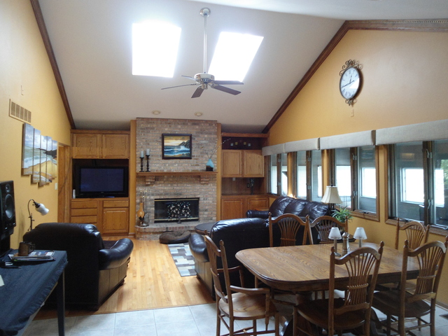 10280 Branch Road Rochelle, IL 61068 - Photo 3 of 17 a view of a dining room with furniture window and wooden floor