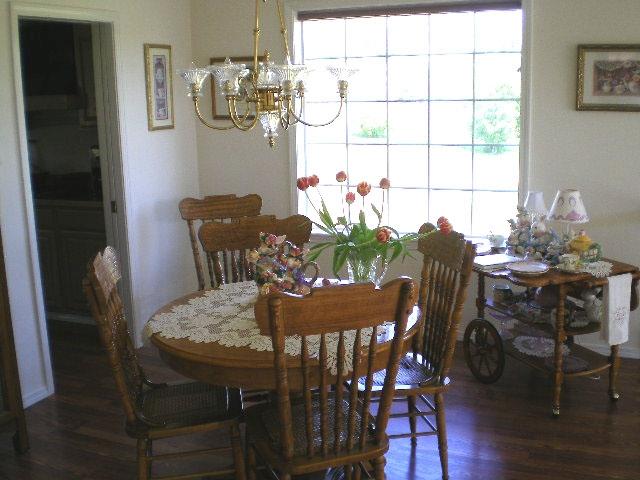 10611 Summitview Road Yakima, WA 98908 - Photo 3 of 10 a view of a dining room with furniture and chandelier