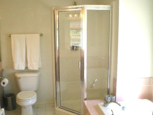 10611 Summitview Road Yakima, WA 98908 - Photo 8 of 10 a bathroom with a shower and a toilet