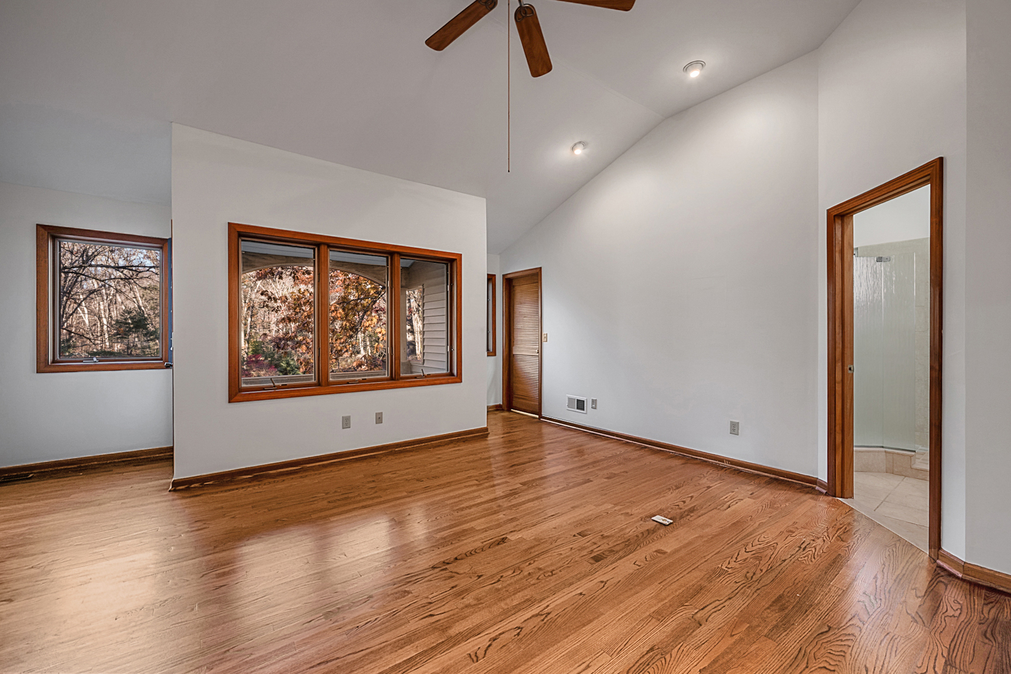 75 Hart Road Guilford, CT 06437 - Photo 14 of 30 Master bedroom with window and porch overlooking pond