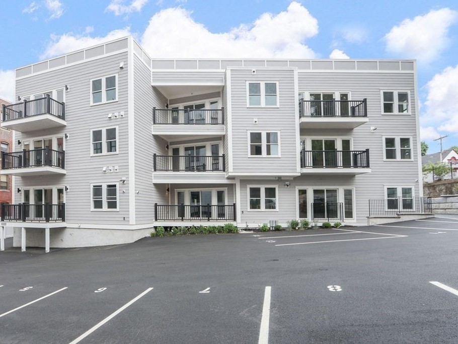 21 Glen Road, Unit 7 Boston, MA 02130 - Photo 14 of 15 a front view of a building with a street