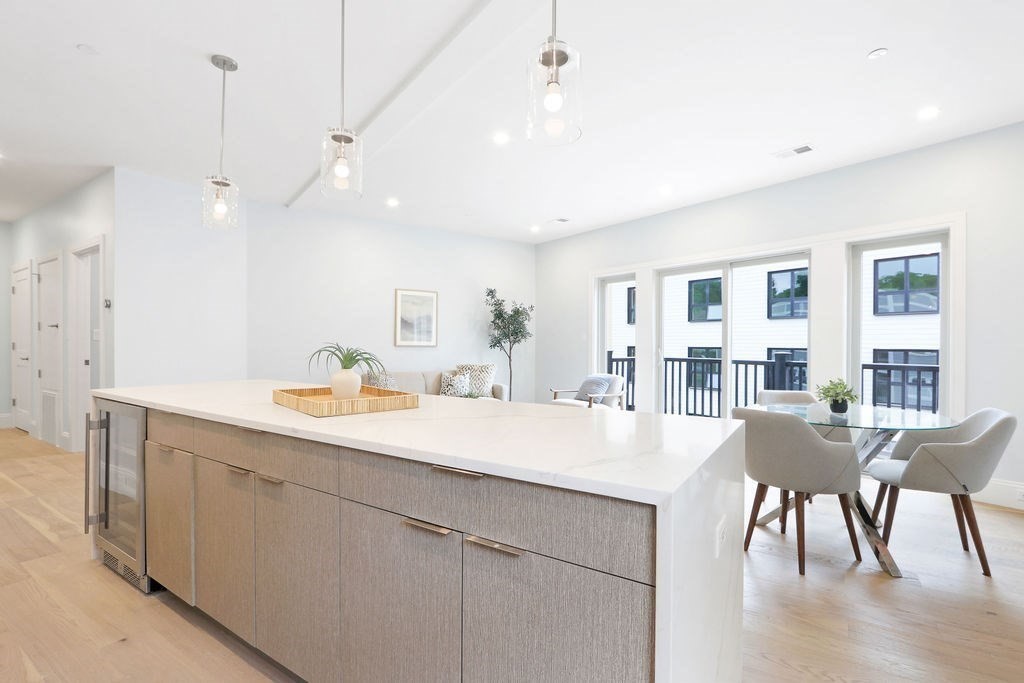 21 Glen Road, Unit 7 Boston, MA 02130 - Photo 6 of 15 a large white kitchen with a large window