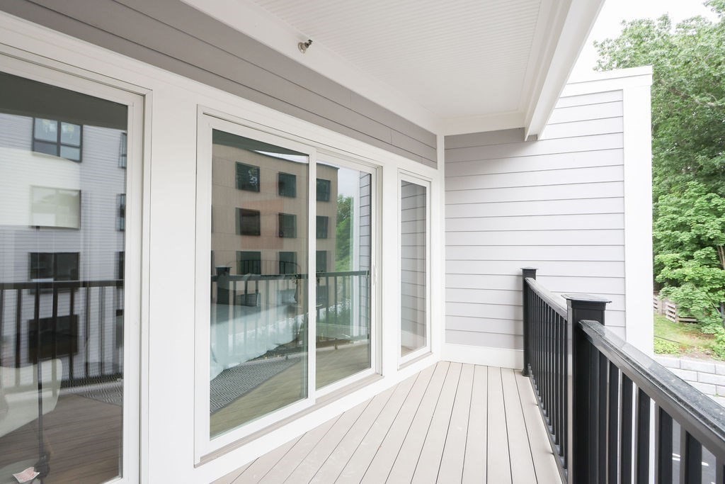 21 Glen Road, Unit 7 Boston, MA 02130 - Photo 8 of 15 a view of outdoor space with deck and living room