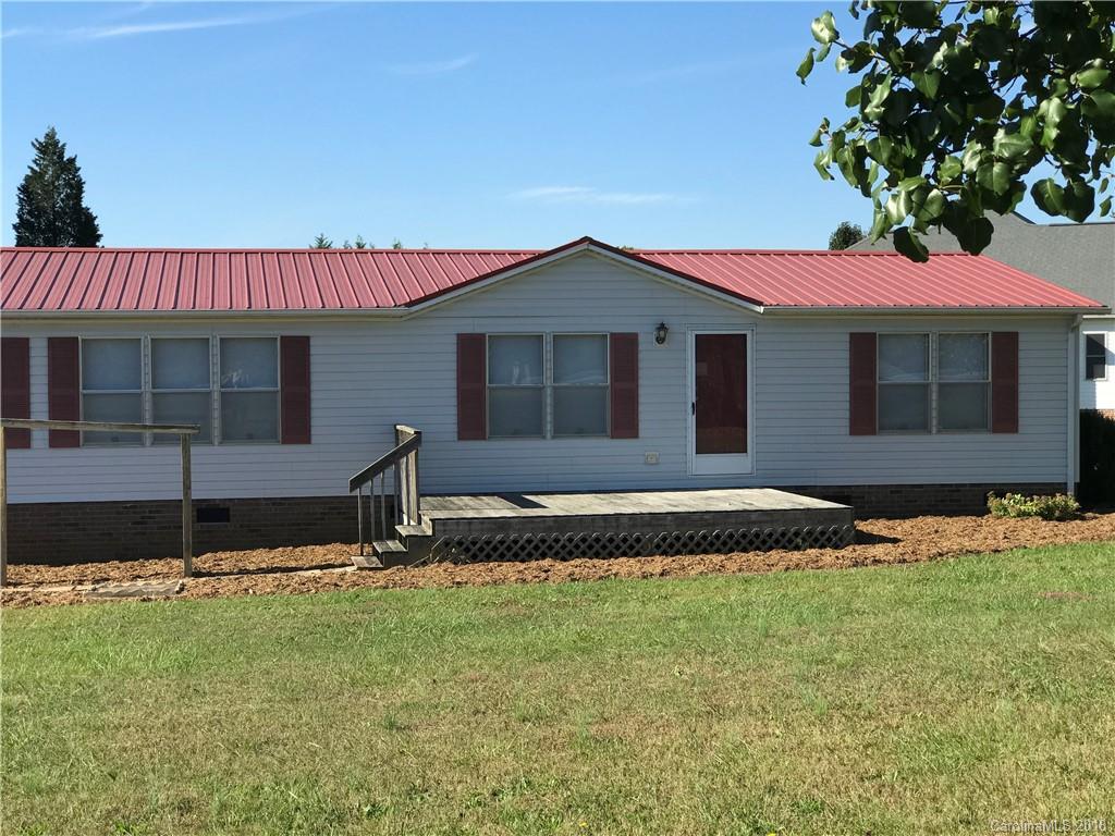 5730 East Bandys Cross Road Catawba, NC 28609 - Photo 1 of 21 a front view of a house with garden