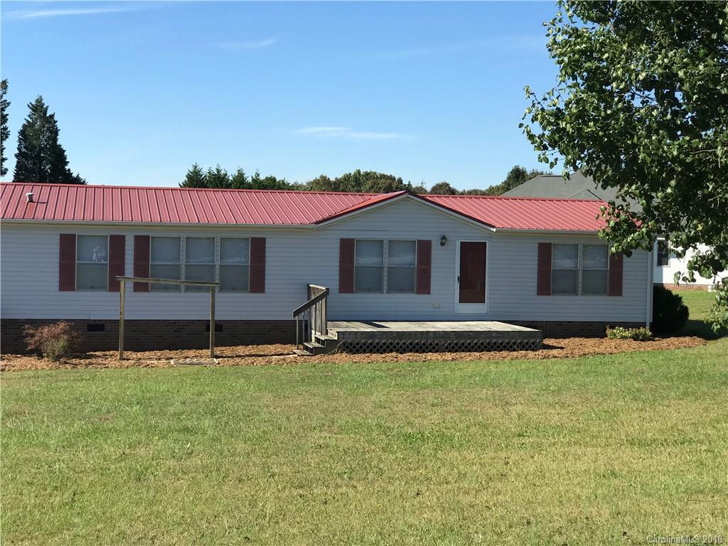 5730 East Bandys Cross Road Catawba, NC 28609 - Photo 2 of 21 a front view of a house with a yard