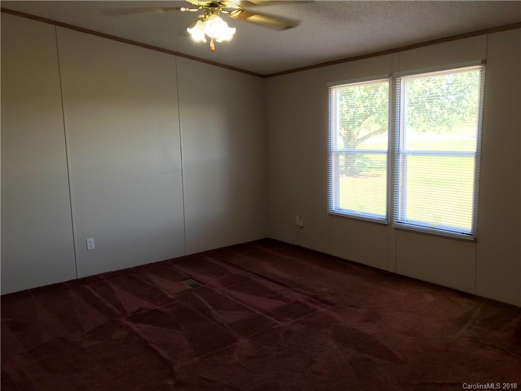 5730 East Bandys Cross Road Catawba, NC 28609 - Photo 12 of 21 a view of an empty room with a window