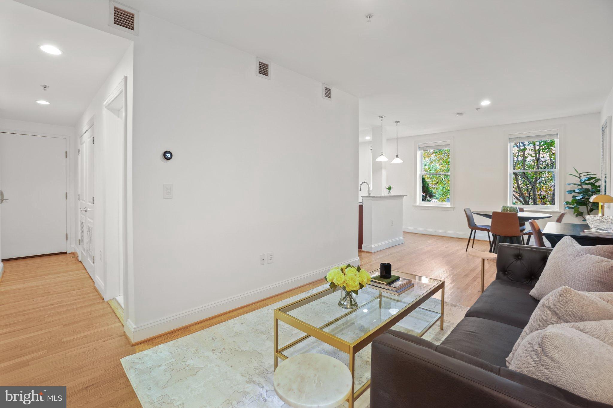 1840 Vernon Street Northwest, Unit 208 Washington, DC 20009 - Photo 12 of 26 a living room with furniture