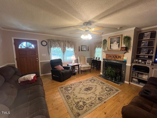 5368 Elevation Road Benson, NC 27504 - Photo 12 of 40 a living room with furniture and a fireplace
