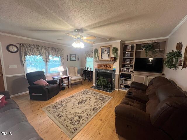 5368 Elevation Road Benson, NC 27504 - Photo 13 of 40 a living room with furniture and a fireplace