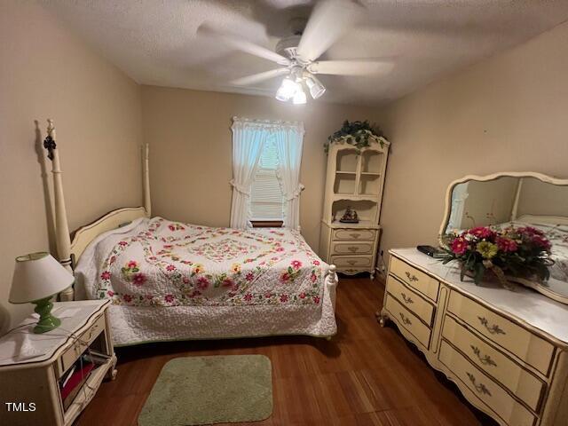 5368 Elevation Road Benson, NC 27504 - Photo 17 of 40 a bedroom with bed and cabinets