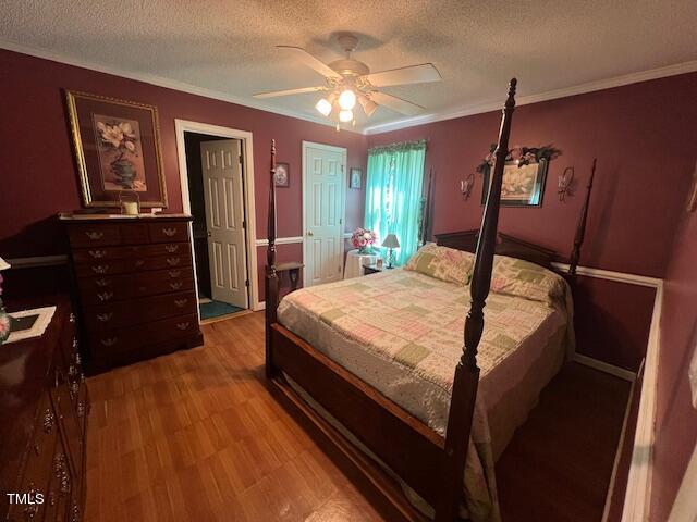 5368 Elevation Road Benson, NC 27504 - Photo 21 of 40 a bed sitting in a bedroom next to a window