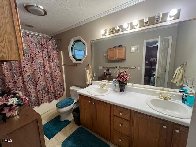 5368 Elevation Road Benson, NC 27504 - Photo 24 of 40 a bathroom with a sink vanity mirror and toilet