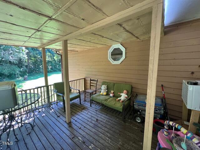 5368 Elevation Road Benson, NC 27504 - Photo 29 of 40 a outdoor living space with furniture