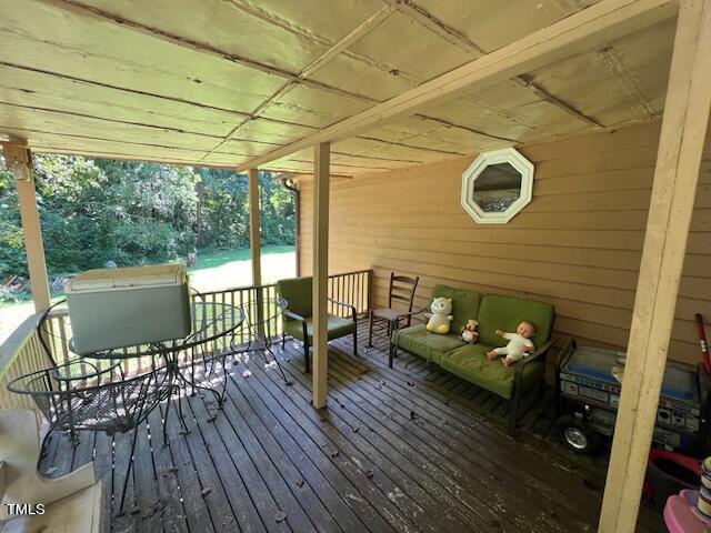 5368 Elevation Road Benson, NC 27504 - Photo 30 of 40 a outdoor living space with furniture