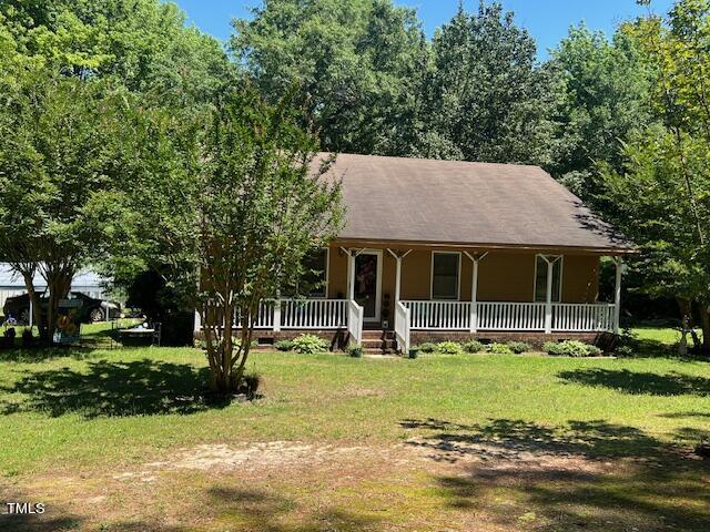 5368 Elevation Road Benson, NC 27504 - Photo 3 of 40 a view of a house with a yard and sitting area