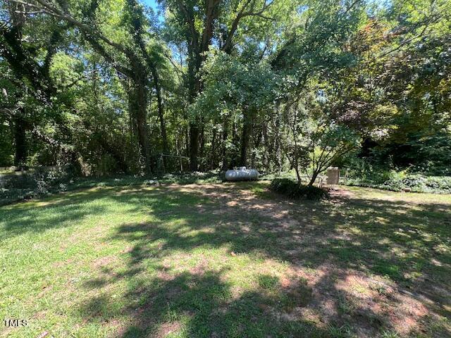 5368 Elevation Road Benson, NC 27504 - Photo 32 of 40 a view of outdoor space with trees