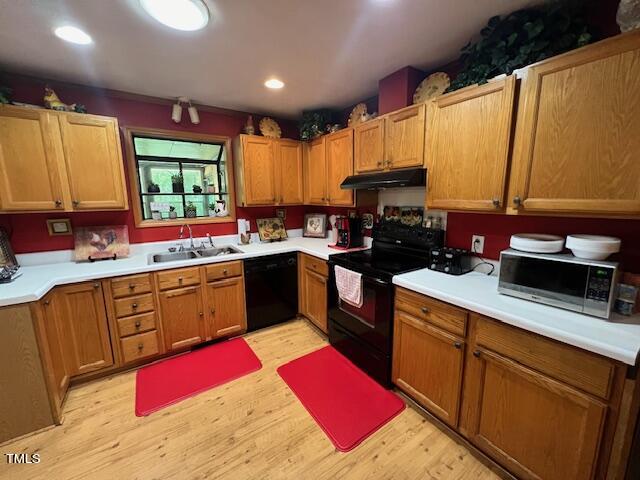 5368 Elevation Road Benson, NC 27504 - Photo 6 of 40 a kitchen with stainless steel appliances kitchen island granite countertop a sink a stove a refrigerator cabinets and a window
