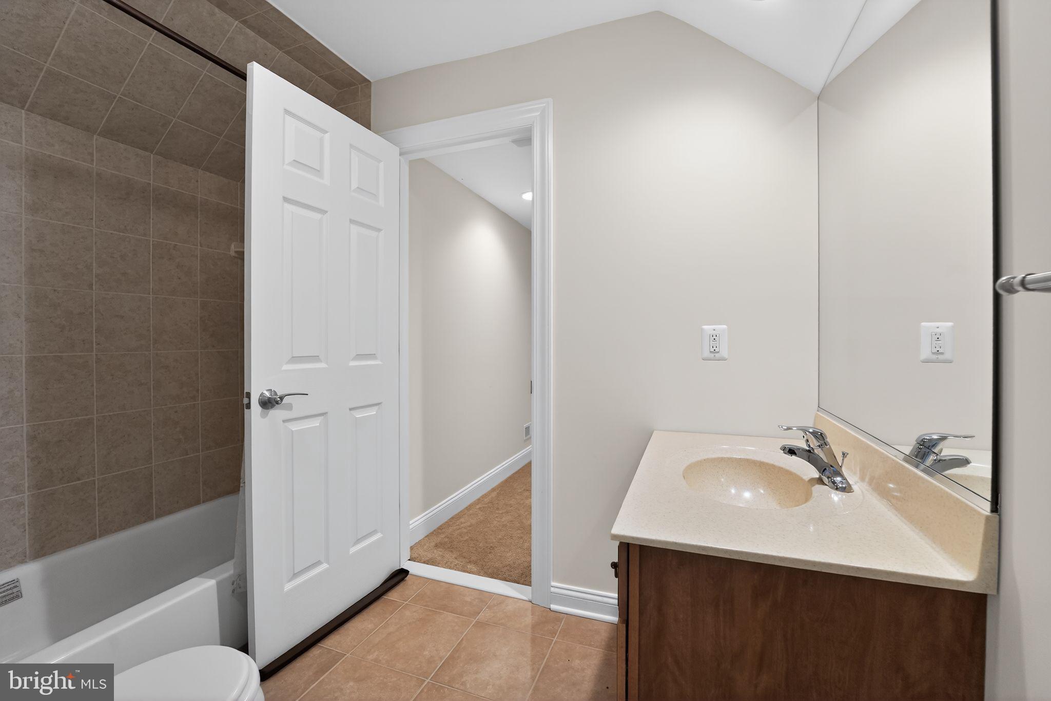 1165 Line Road Westminster, MD 21158 - Photo 38 of 75 a bathroom with a sink and a mirror