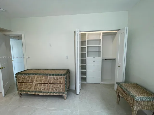 a view of room with walk in closet