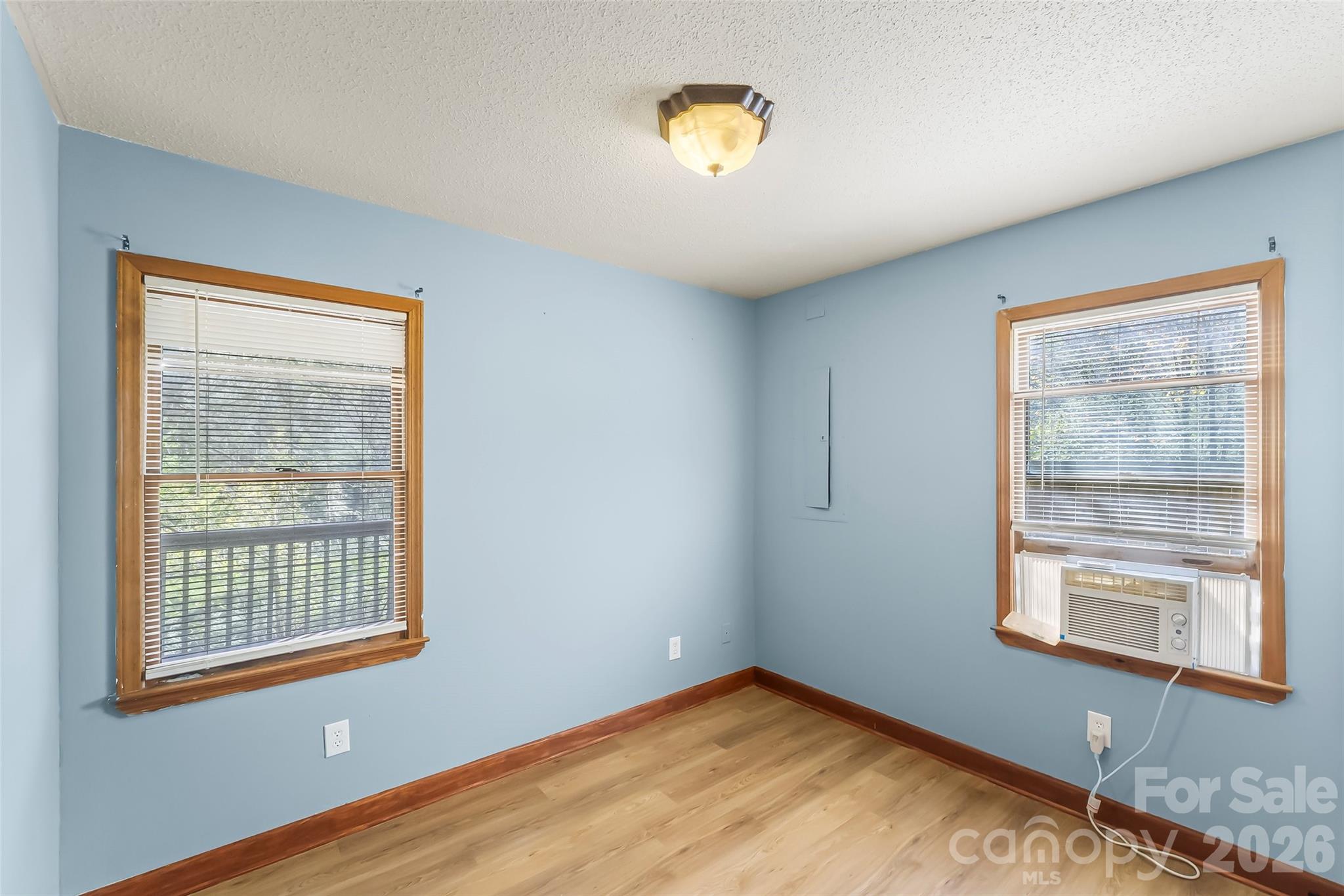 242 Plott Balsam Road Maggie Valley, NC 28751 - Photo 16 of 32 a view of an empty room with a window
