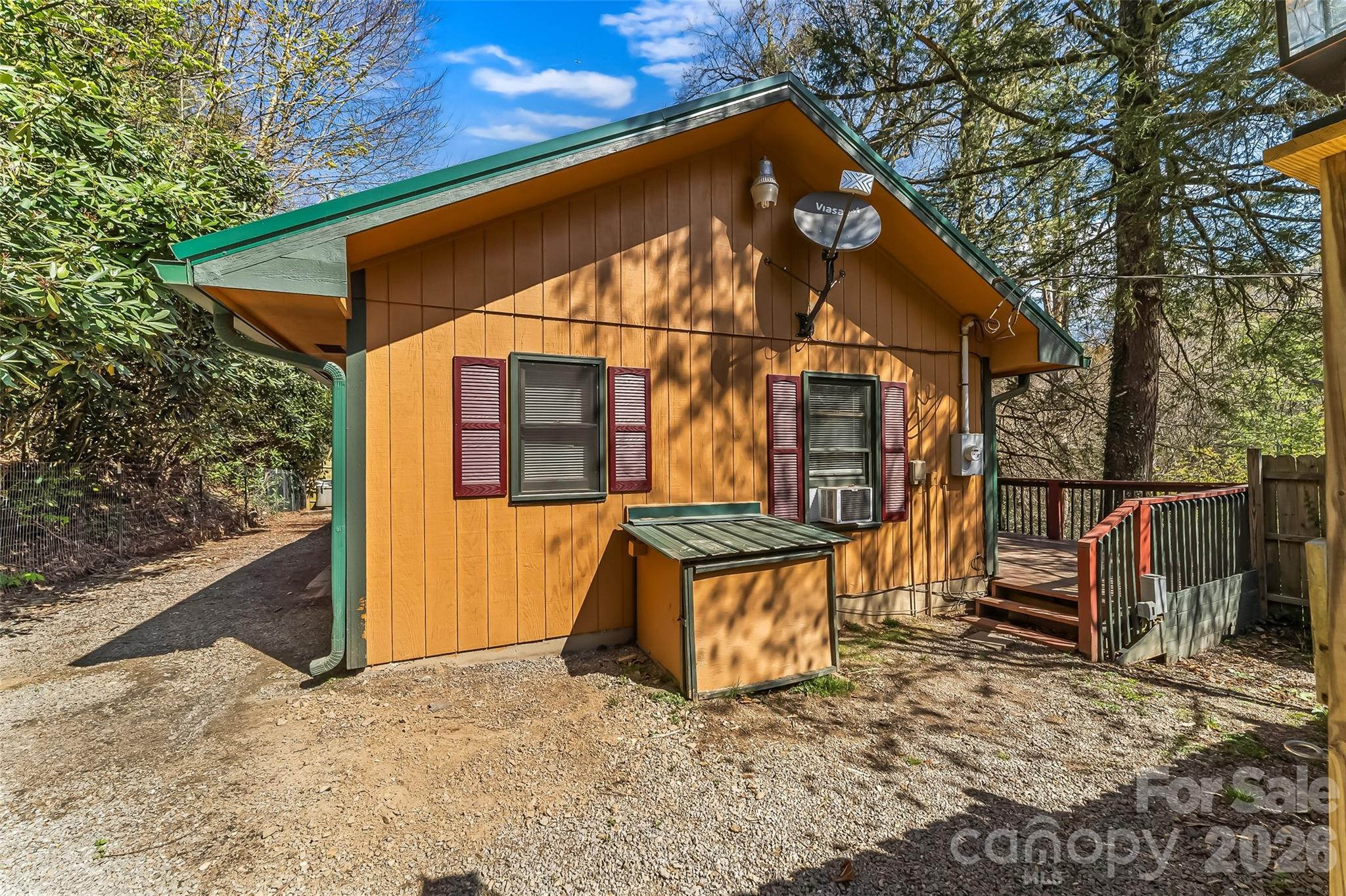 242 Plott Balsam Road Maggie Valley, NC 28751 - Photo 28 of 32 a view of a house with a yard
