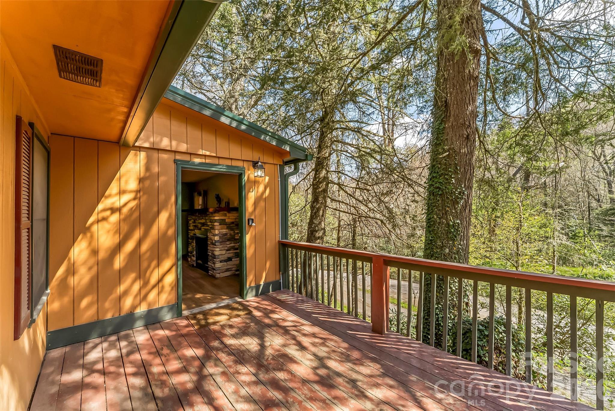 242 Plott Balsam Road Maggie Valley, NC 28751 - Photo 3 of 32 a view of a porch