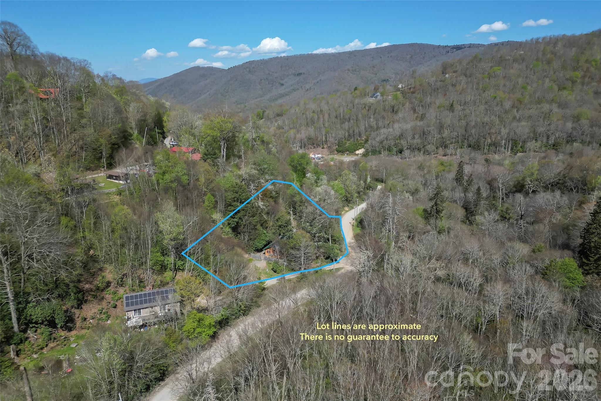 242 Plott Balsam Road Maggie Valley, NC 28751 - Photo 32 of 32 a view of a house with a mountain view