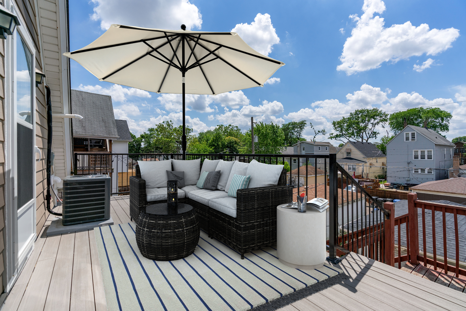 4624 North Springfield Avenue Chicago, IL 60625 - Photo 42 of 44 a view of a roof deck with dining table and chairs